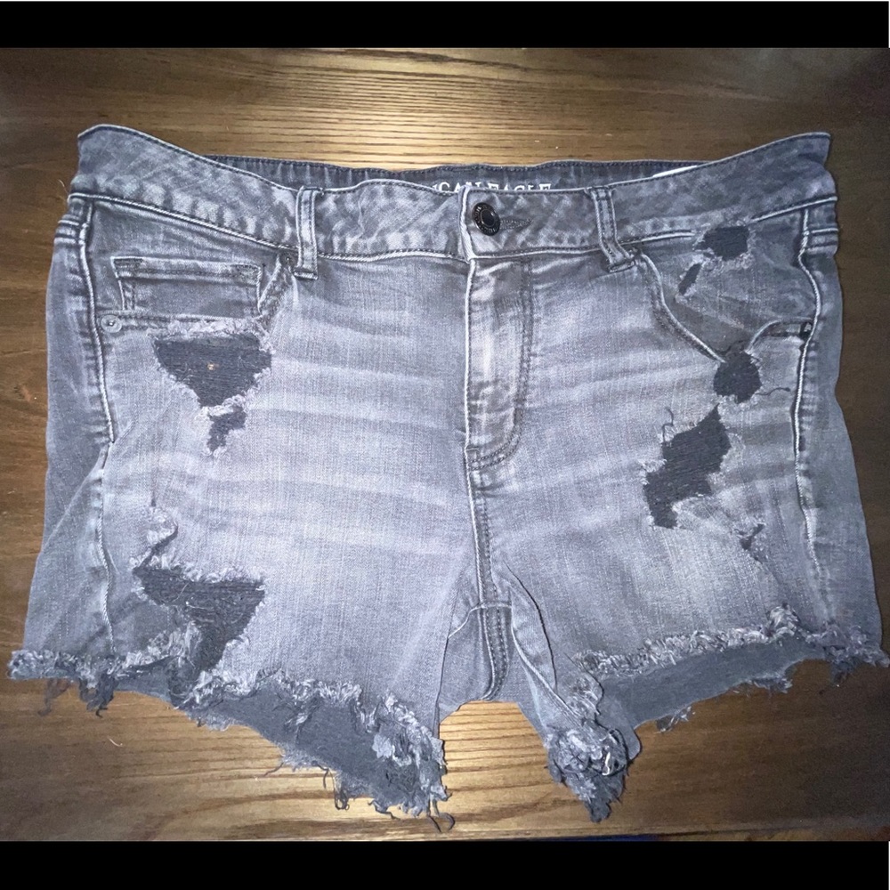 Faded black distressed shorts. Size 16.